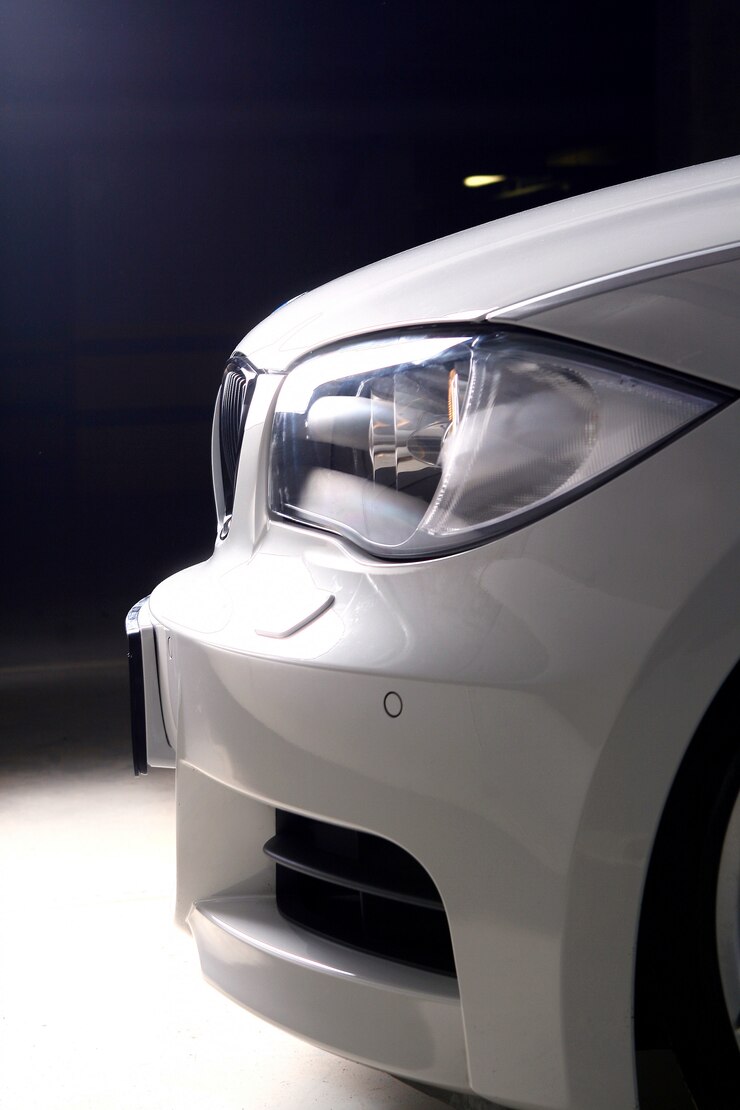new-white-car-black-background_144627-8957
